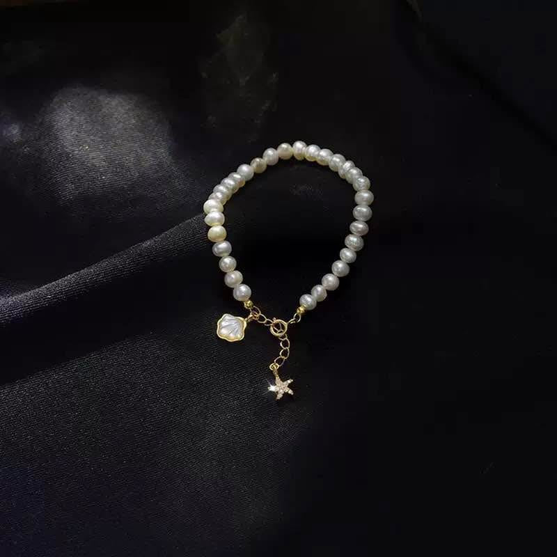 Freshwater Pearl Bracelet with Seashell & Starfish Charms
